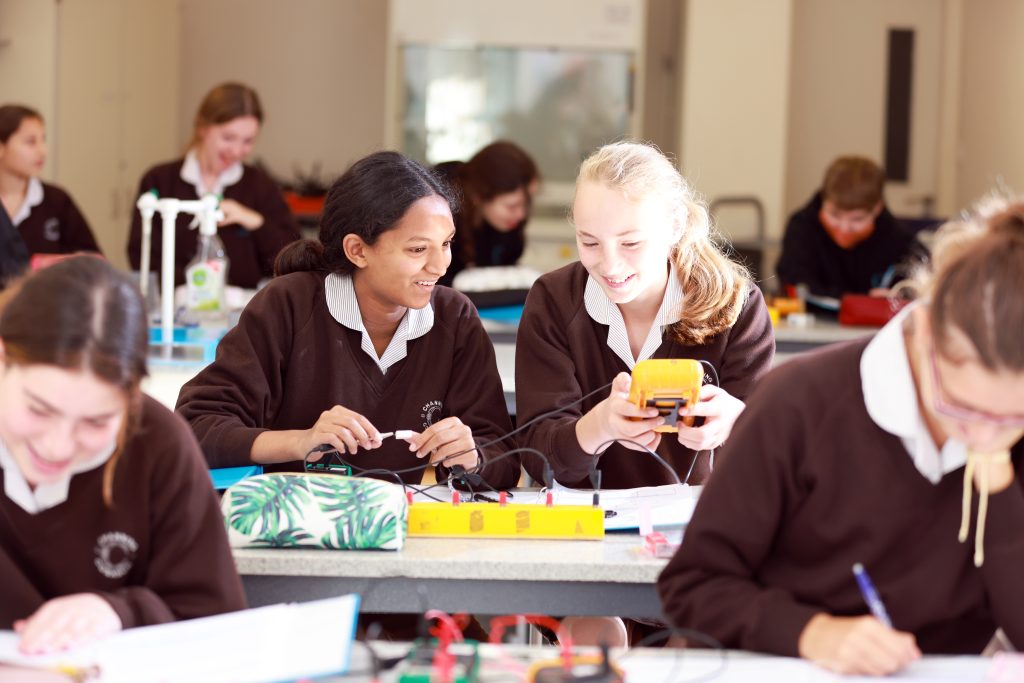 girls working with circuits