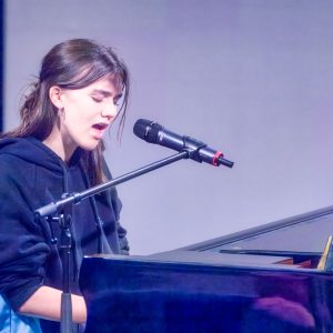 girl playing the piano