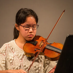 Student playing the violin