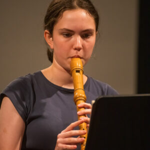 Student playing the recorder