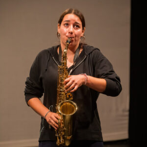 Person playing the saxophone