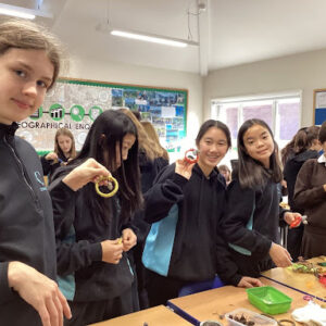 students holding rings