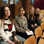 students sat in chairs