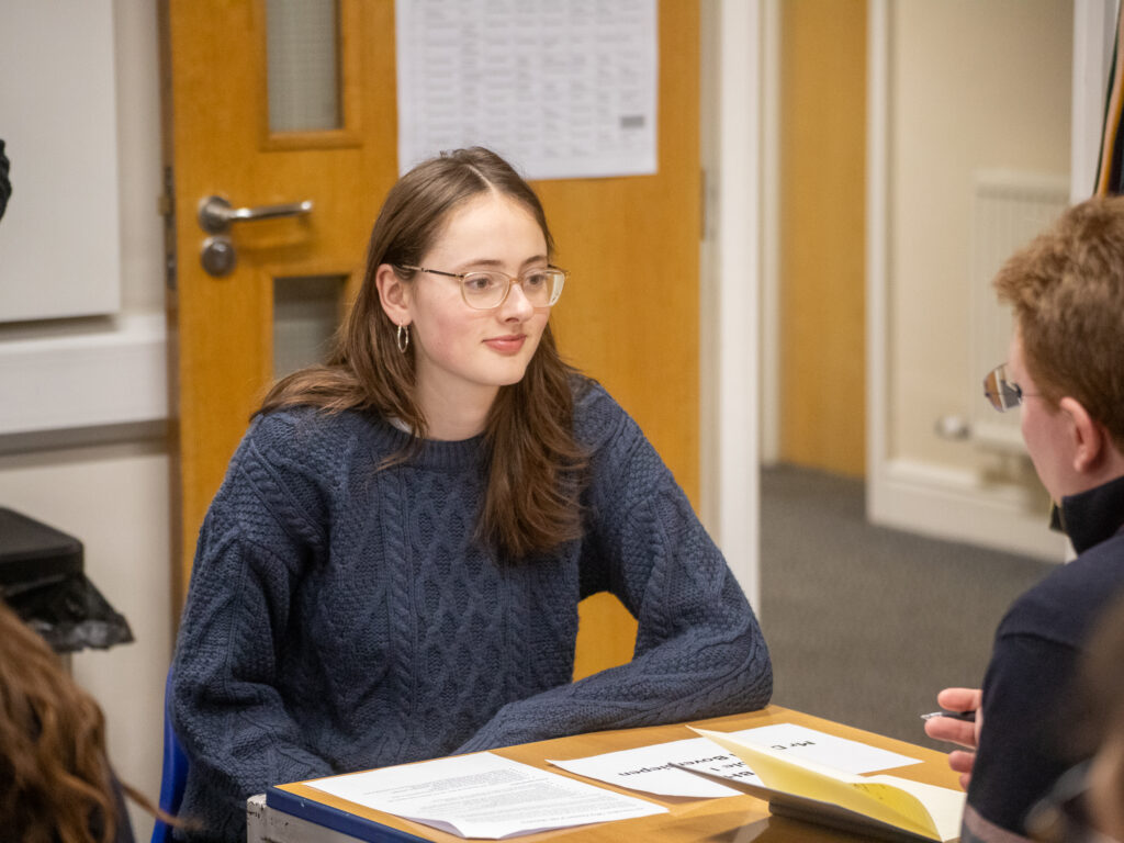 teacher talking to a student