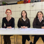 3 students sat at a table