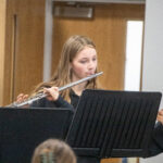 girls playing the flute