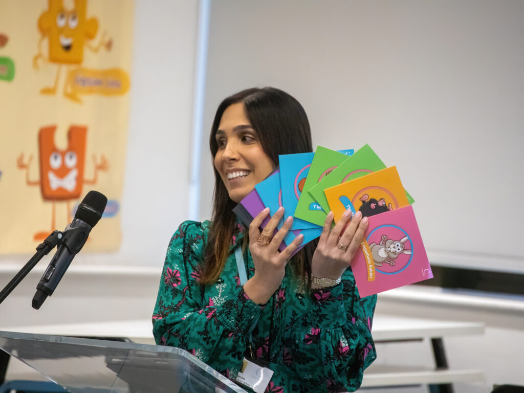 teacher with cards in her hand