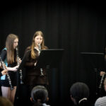 students playing music