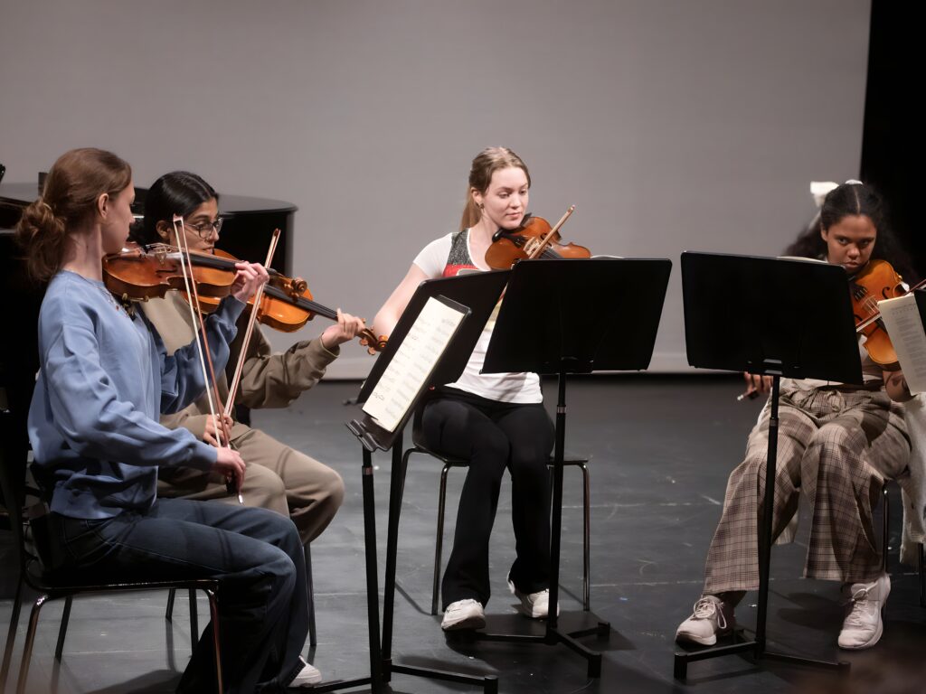 students playing music