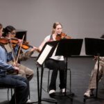 students playing music