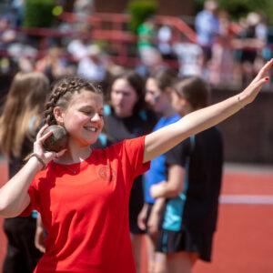 girl throwing a ball